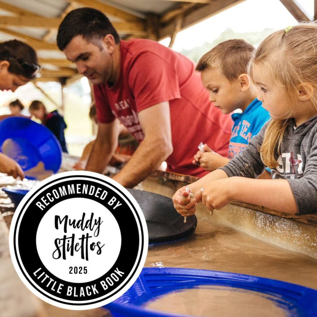 family panning for gold with the muddy stilettos stamp